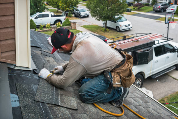 Professional Roof Installation technician working in Mystic, IA